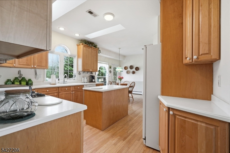 140 Bunker Hill Road Princeton, NJ 08540 - Photo 10 of 44 a kitchen with stainless steel appliances granite countertop a sink a stove and a refrigerator
