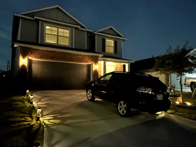 a car parked in front of a house
