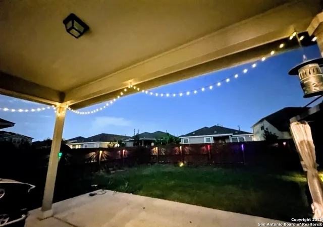 a view of a yard with an outdoor space