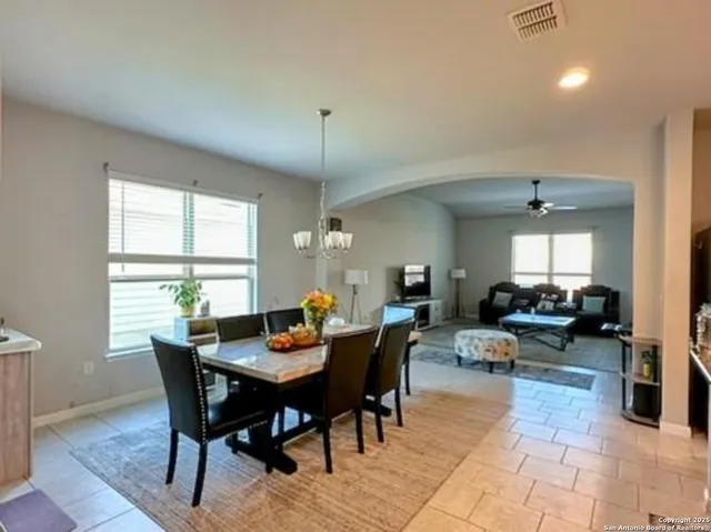 a view of a dining room with furniture