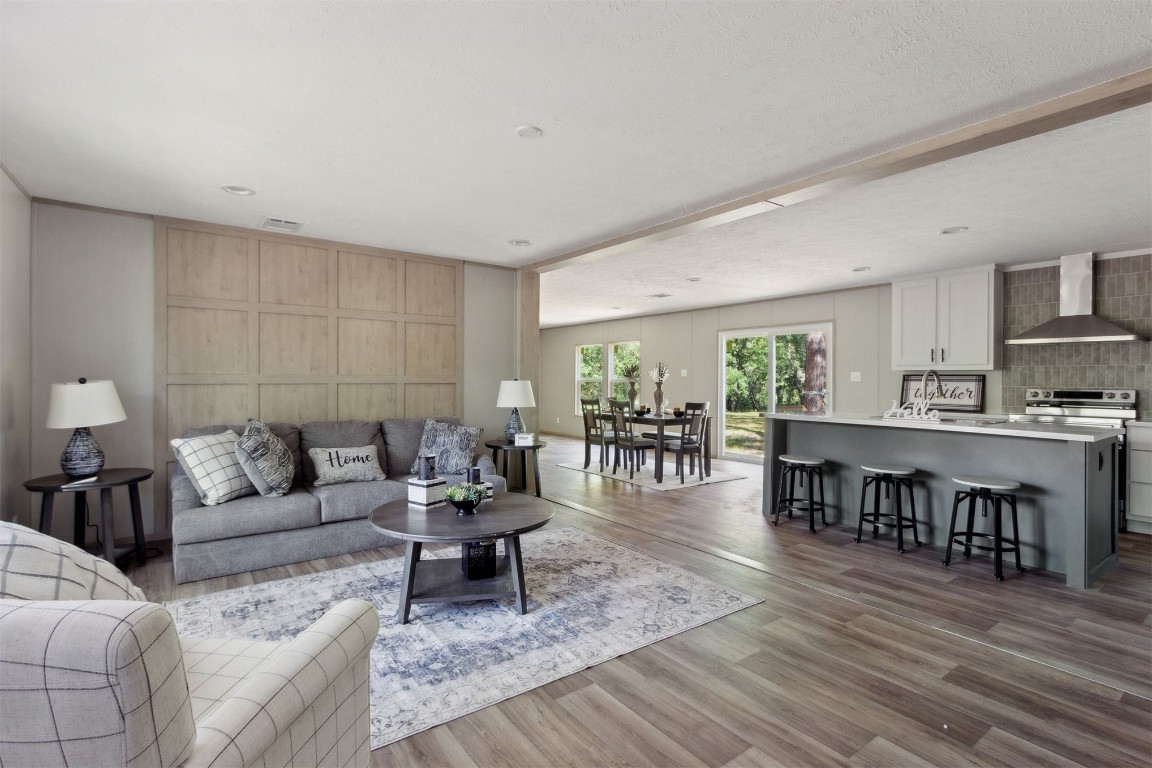 54178 Bea Road Callahan, FL 32011 - Photo 13 of 36 a living room with furniture and wooden floor