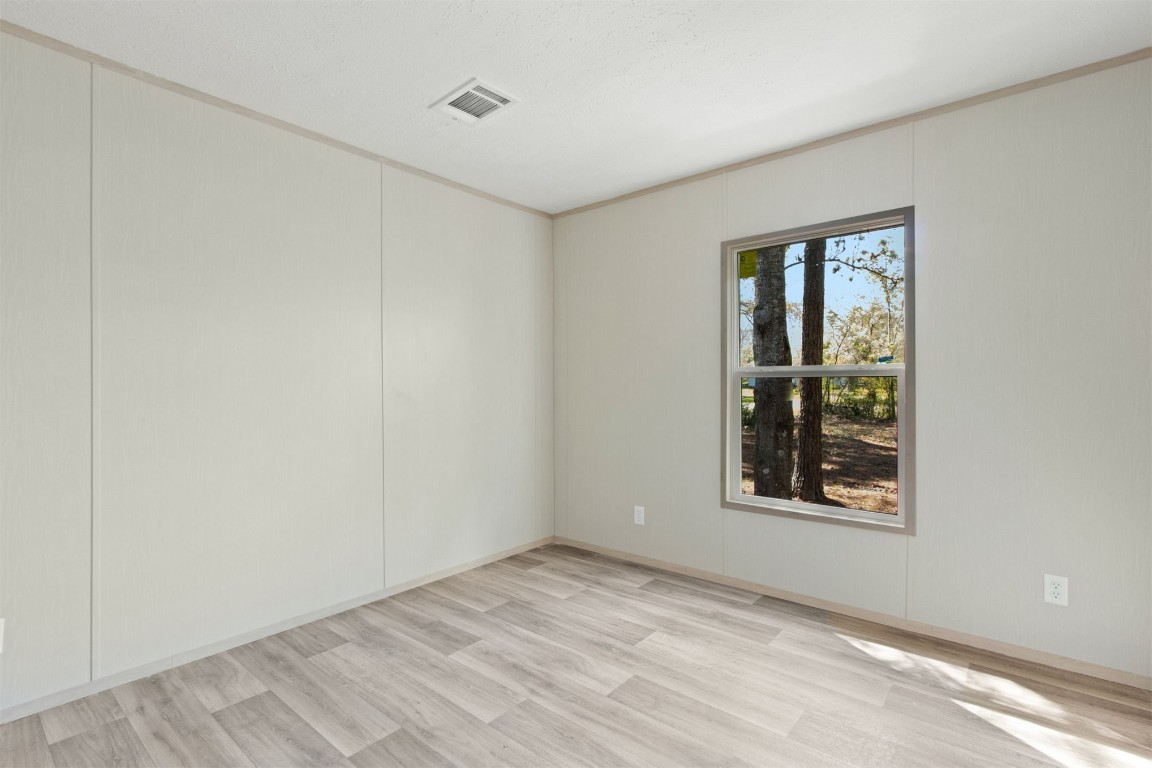54178 Bea Road Callahan, FL 32011 - Photo 27 of 36 a view of an empty room with a window