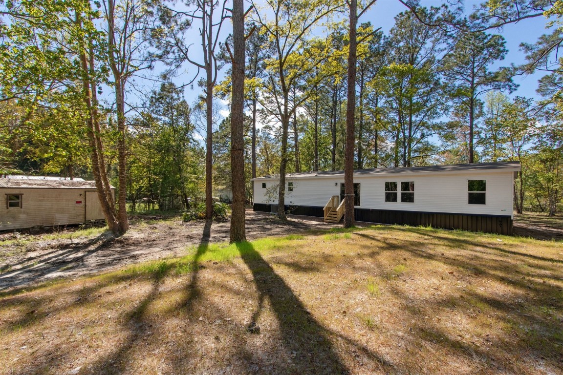 54178 Bea Road Callahan, FL 32011 - Photo 35 of 36 a view of a house with snow on the background