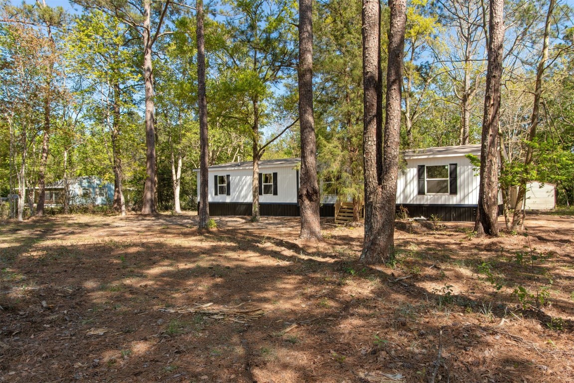 54178 Bea Road Callahan, FL 32011 - Photo 10 of 36 front view of a house with a yard