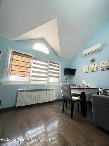 a room with furniture and window