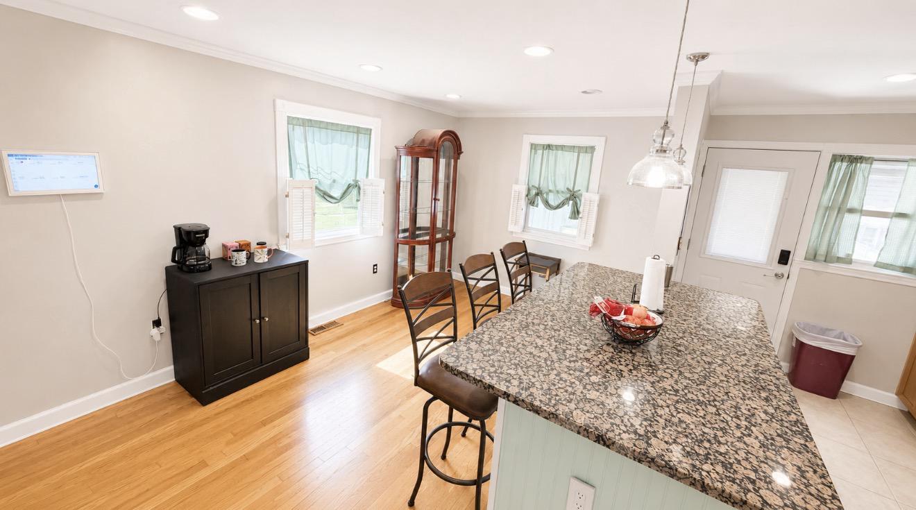 8027 Park Haven Road Dundalk, MD 21222 - Photo 7 of 13 Bright and inviting dining space.
Edit with AI