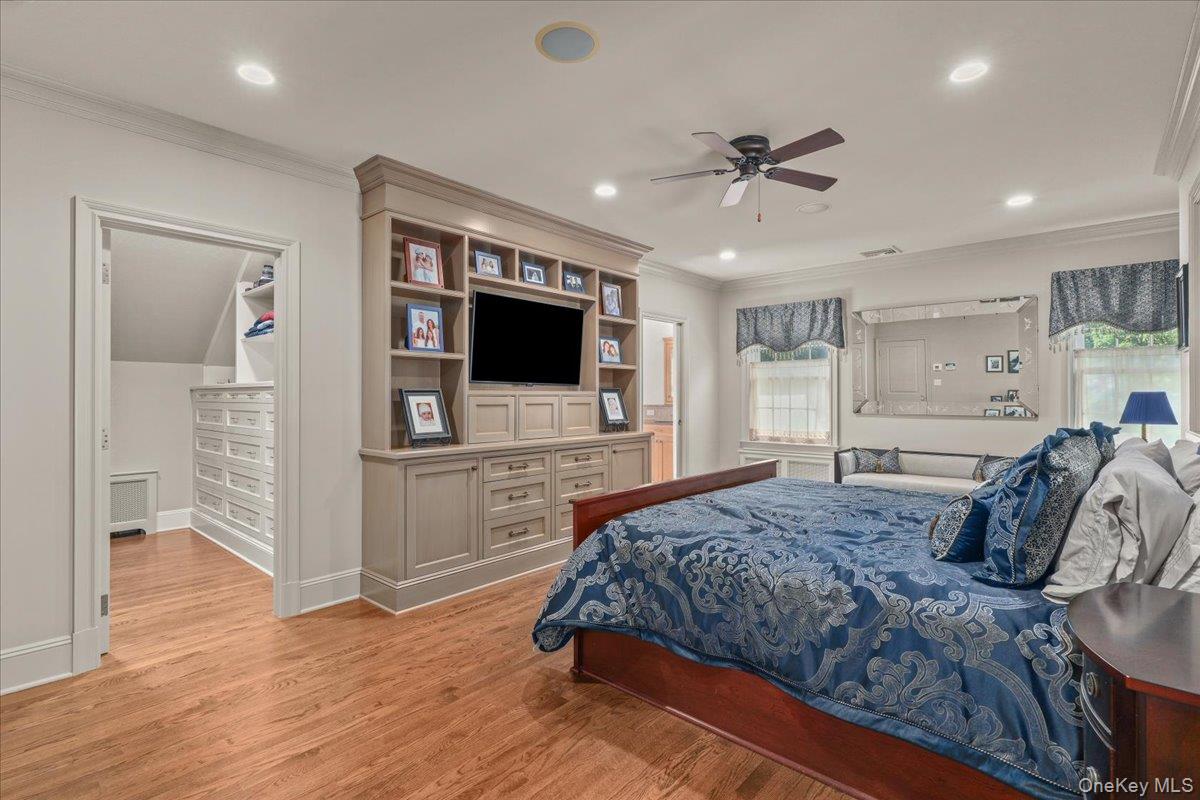 135 Pines Bridge Road Katonah, NY 10536 - Photo 14 of 40 a bedroom with a bed and a flat screen tv