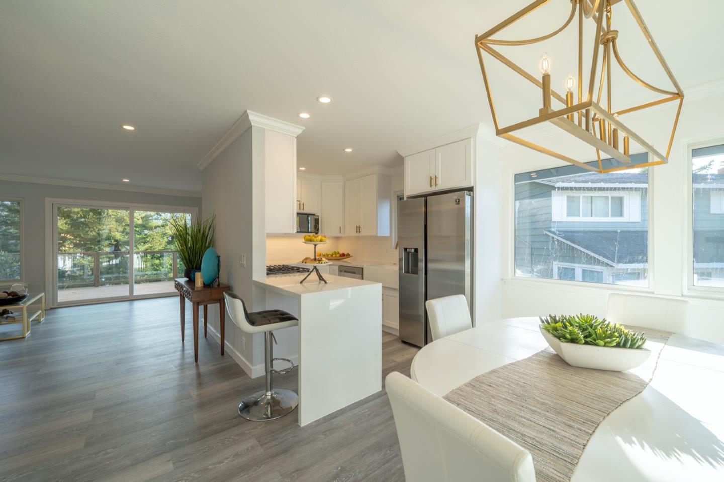 17 Point Reyes Way Pacifica, CA 94044 - Photo 10 of 65 a living room with furniture a wooden floor and a window