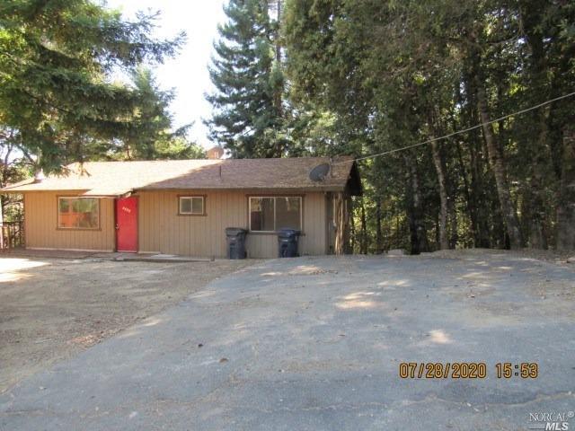 2259 Goose Road Willits, CA 95490 - Photo 1 of 1 a front view of a house with a yard and garage