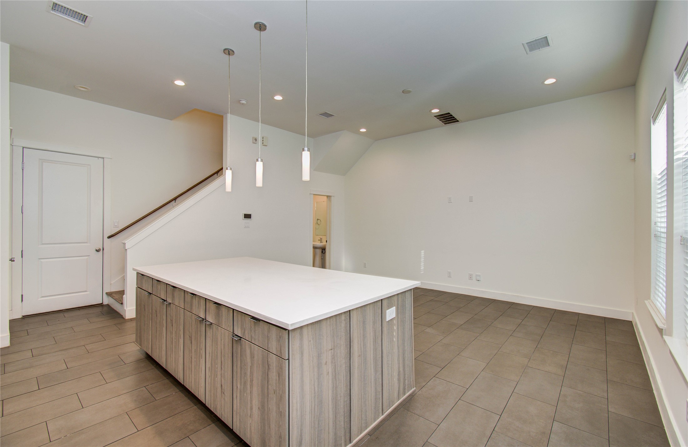 556 Janisch Road Houston, TX 77018 - Photo 8 of 29 a very nice looking room with wooden floor