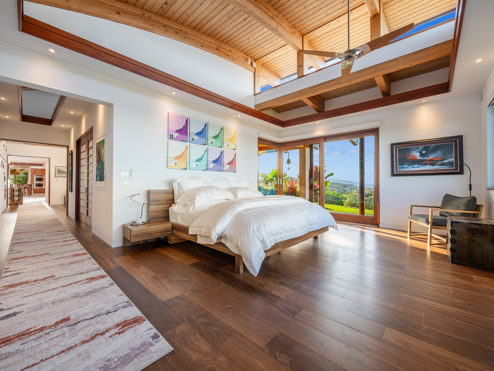 45-5038 Nānaina Kai Road Honokaa, HI 96727 - Photo 11 of 29 a bedroom with a bed wooden floor and window