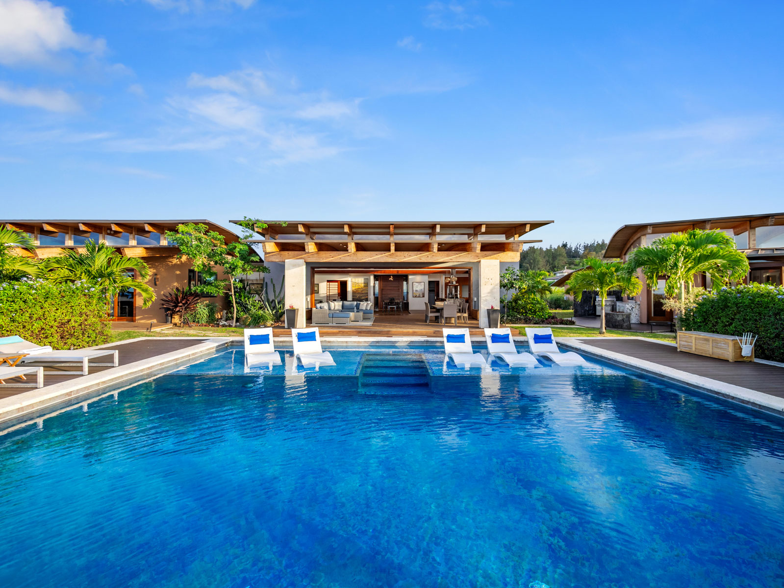 45-5038 Nānaina Kai Road Honokaa, HI 96727 - Photo 17 of 29 a view of swimming pool with outdoor seating and deck