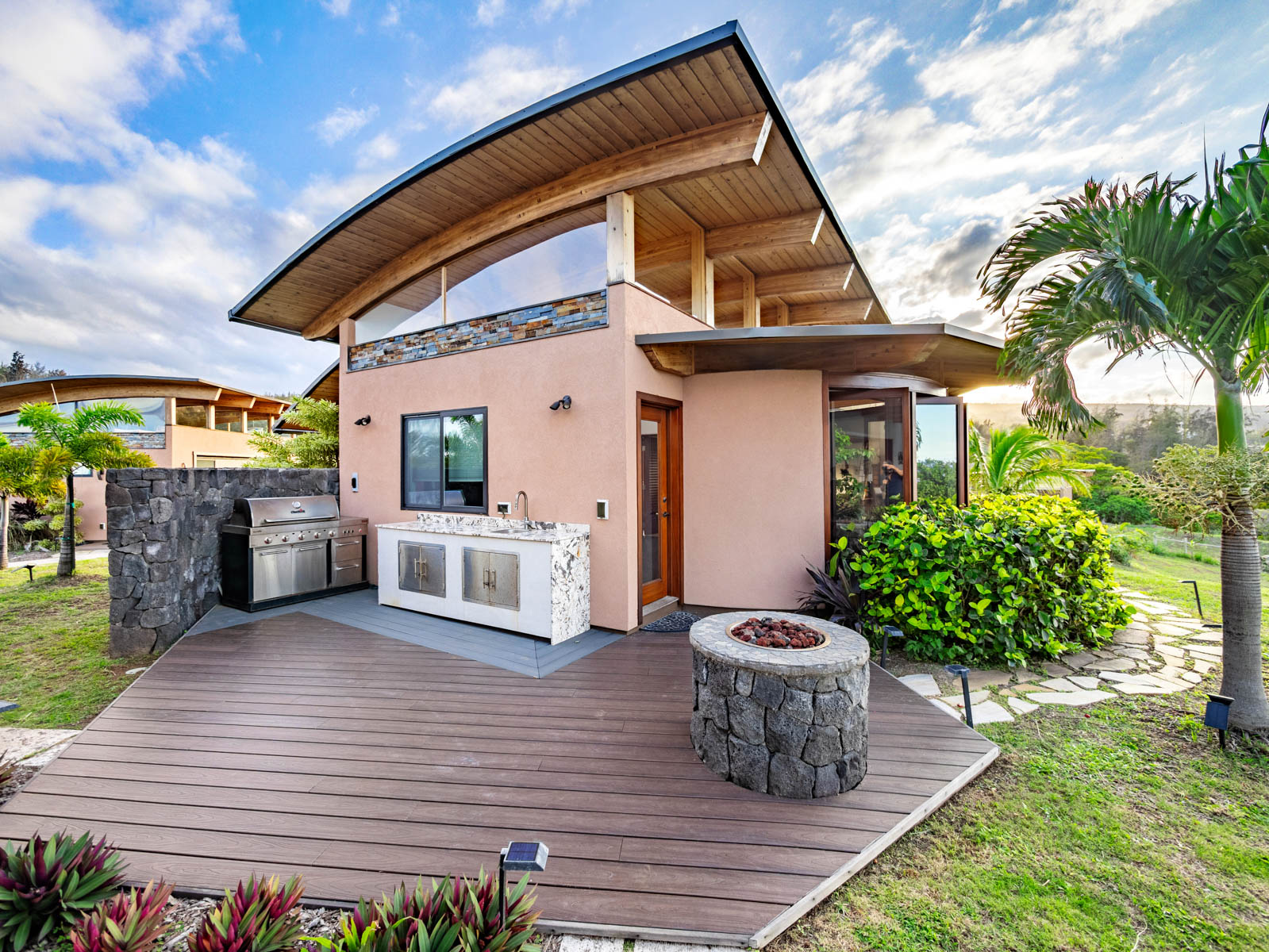 45-5038 Nānaina Kai Road Honokaa, HI 96727 - Photo 21 of 29 a view of a house with backyard and sitting area