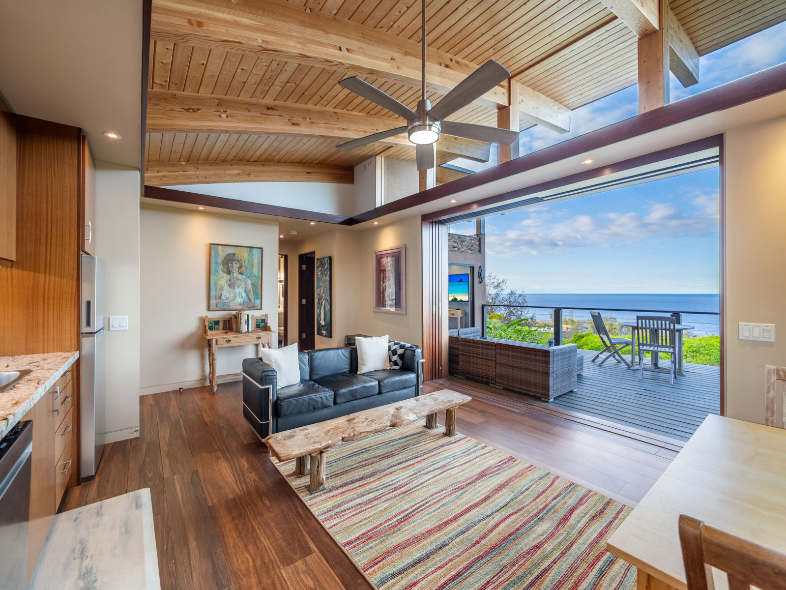 45-5038 Nānaina Kai Road Honokaa, HI 96727 - Photo 26 of 29 a living room with furniture and wooden floor