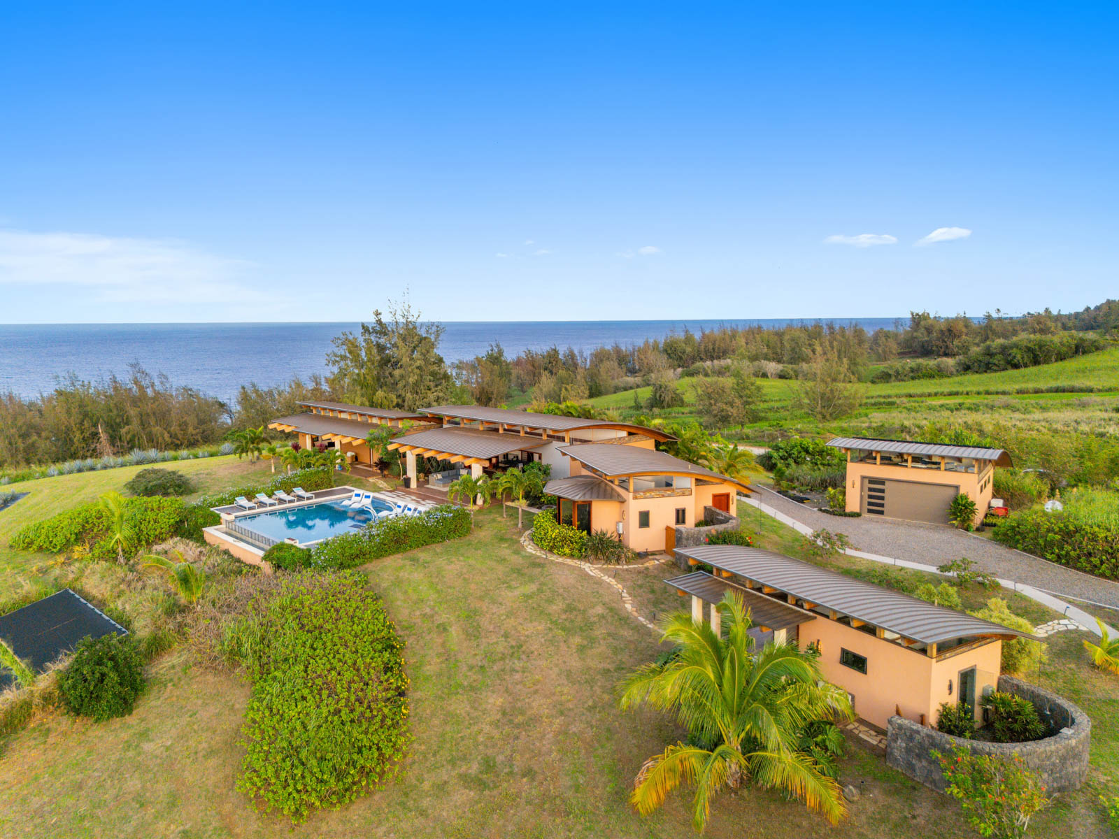 45-5038 Nānaina Kai Road Honokaa, HI 96727 - Photo 28 of 29 an aerial view of residential houses with outdoor space
