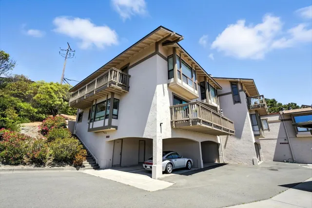 a view of a house with a street