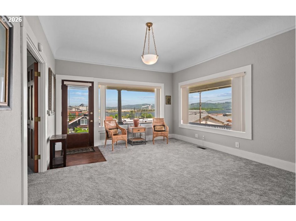 406 West C Street Rainier, OR 97048 - Photo 12 of 48 a living room with furniture and a window