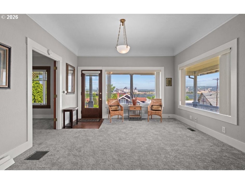 406 West C Street Rainier, OR 97048 - Photo 13 of 48 a living room with furniture and a window