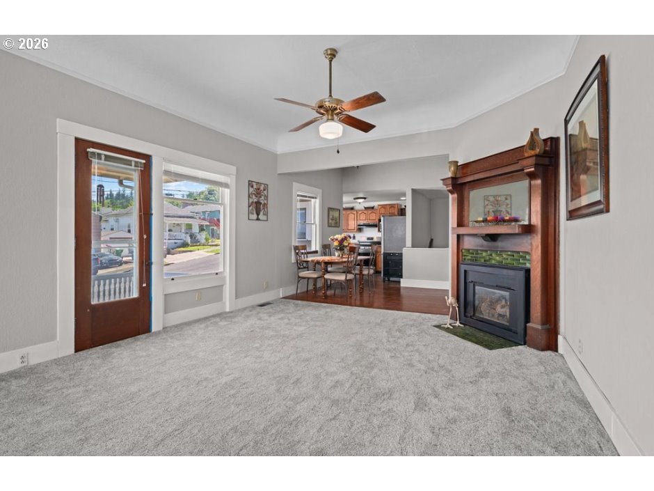406 West C Street Rainier, OR 97048 - Photo 15 of 48 a view of a livingroom with furniture and a ceiling fan