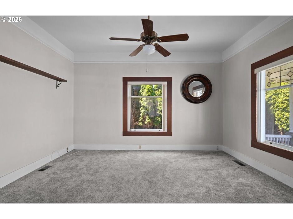 406 West C Street Rainier, OR 97048 - Photo 24 of 48 a view of an empty room with a window