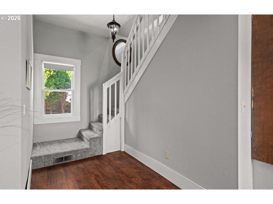 406 West C Street Rainier, OR 97048 - Photo 30 of 48 a view of an entryway with wooden floor