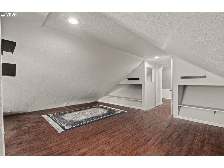 406 West C Street Rainier, OR 97048 - Photo 32 of 48 a view of an empty room and a kitchen