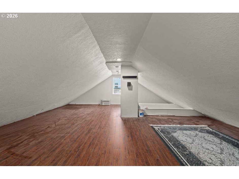 406 West C Street Rainier, OR 97048 - Photo 33 of 48 a view of an empty room and wooden floor
