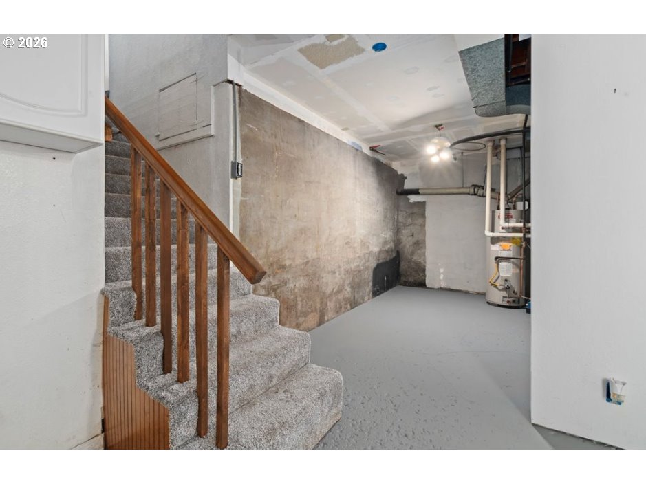 406 West C Street Rainier, OR 97048 - Photo 36 of 48 a view of an empty room with stairs