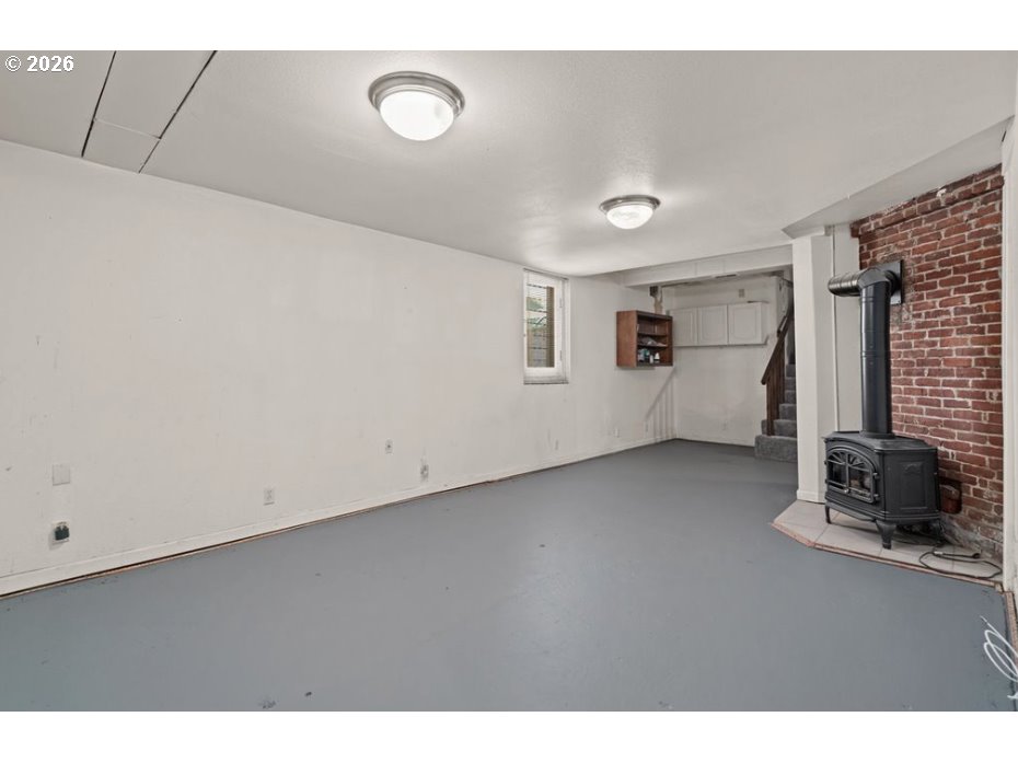 406 West C Street Rainier, OR 97048 - Photo 38 of 48 a view of a livingroom with furniture and a window