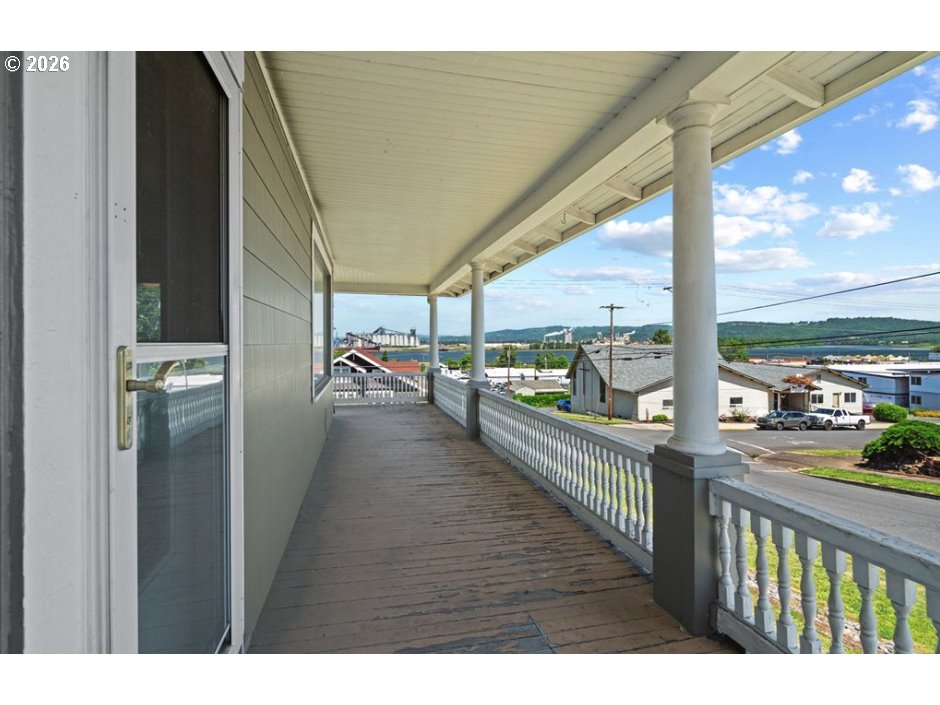 406 West C Street Rainier, OR 97048 - Photo 8 of 48 a view of a balcony