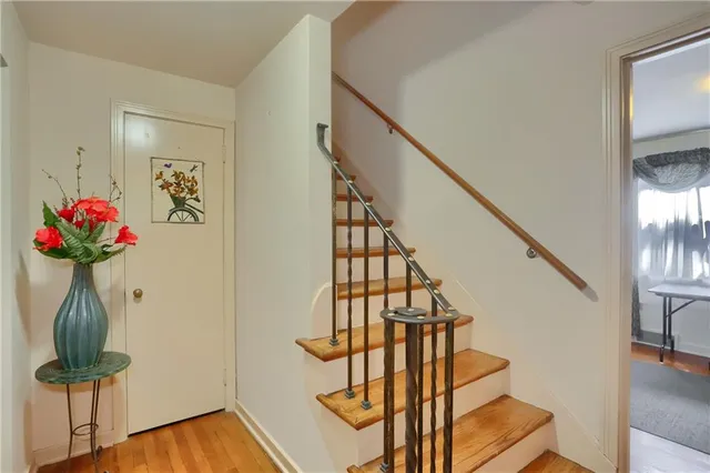 a view of entryway with wooden floor