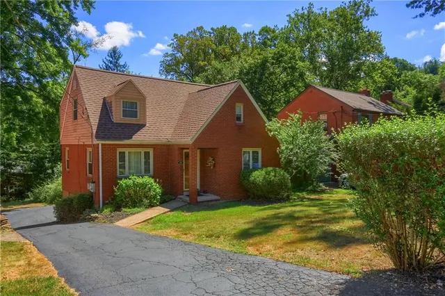 a view of a house with garden