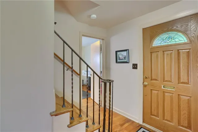 a view of front door with stairs