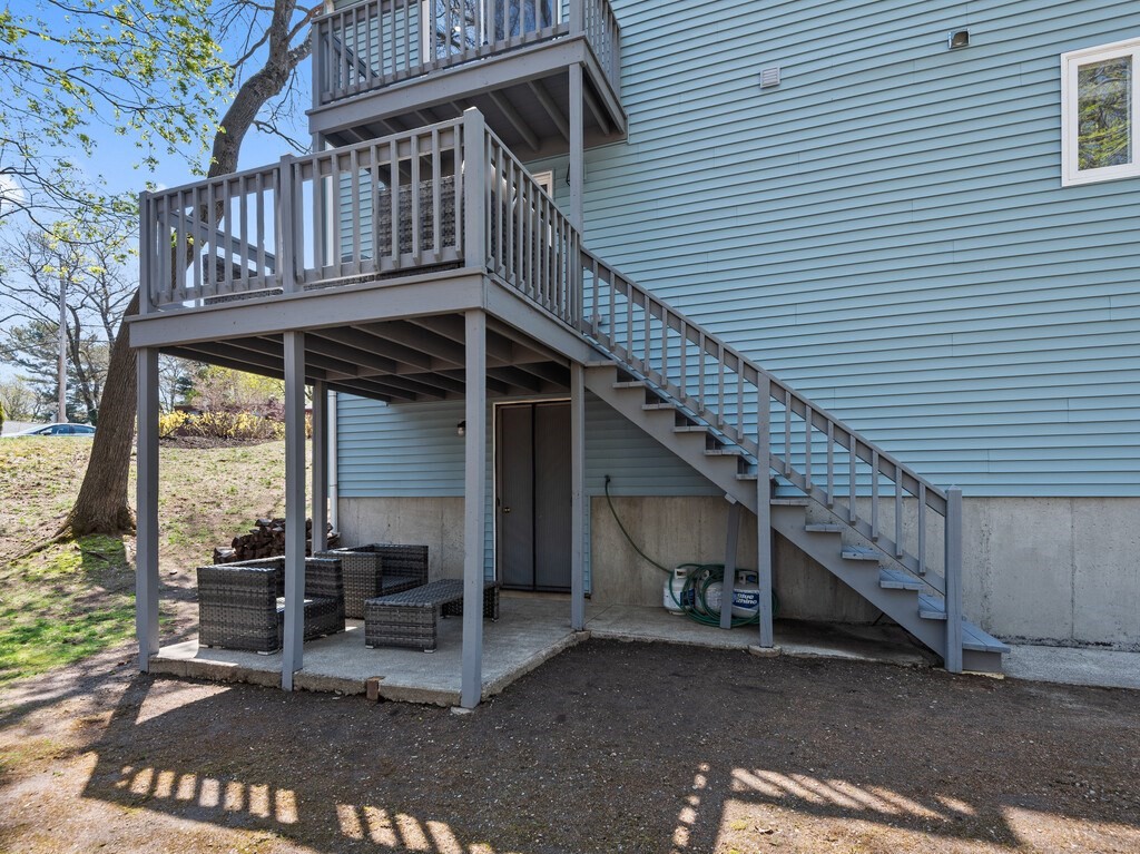 2 Stringer Dam Road Shrewsbury, MA 01545 - Photo 27 of 35 a view of a chair with wooden deck