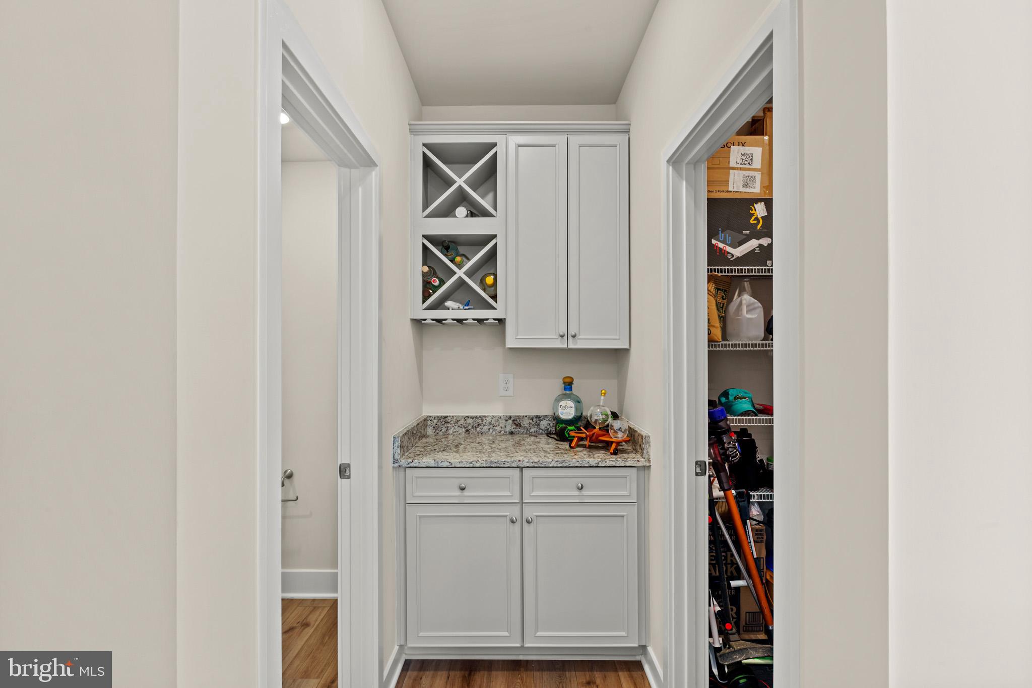 23662 Goodwill Way California, MD 20619 - Photo 13 of 31 Powder room to left and Walk-in pantry to right