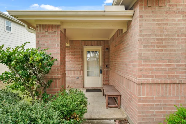 a picture of a bench in the window