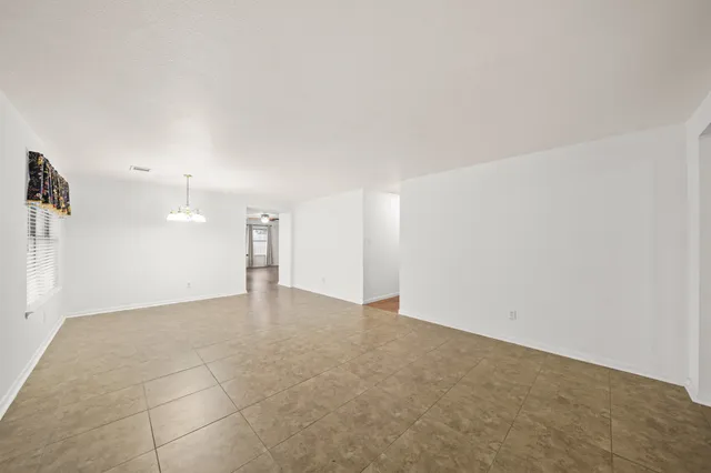 a view of a big room with an empty space