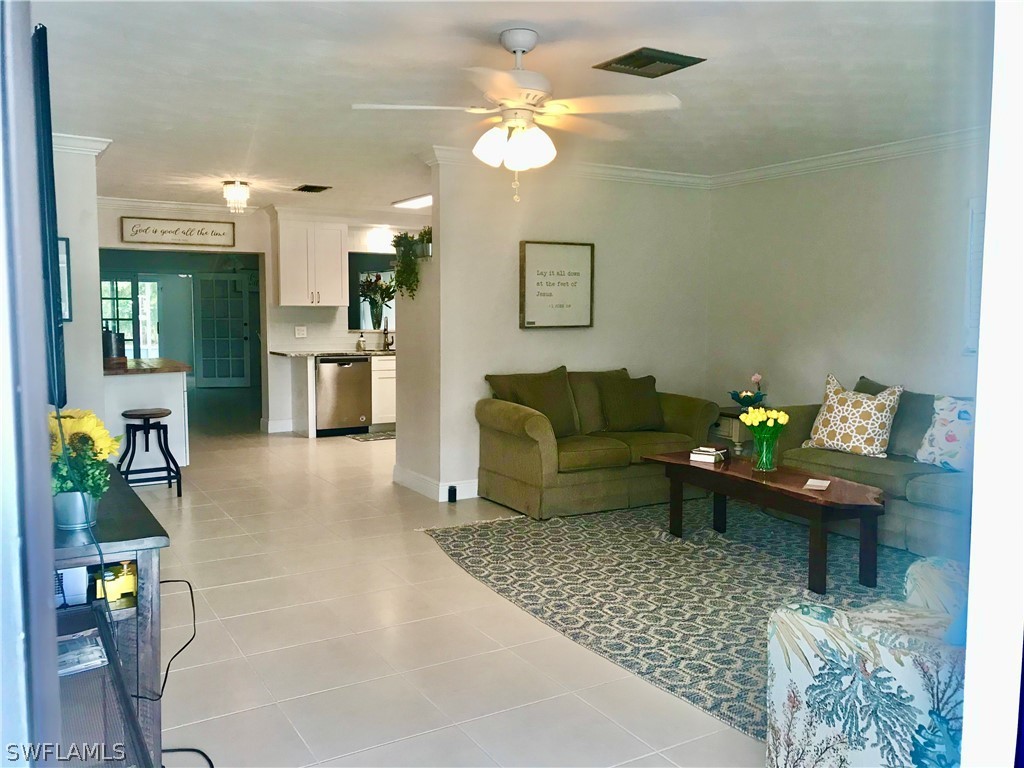 14640 Cemetery Road Fort Myers, FL 33905 - Photo 8 of 23 a living room with furniture and painting on the wall