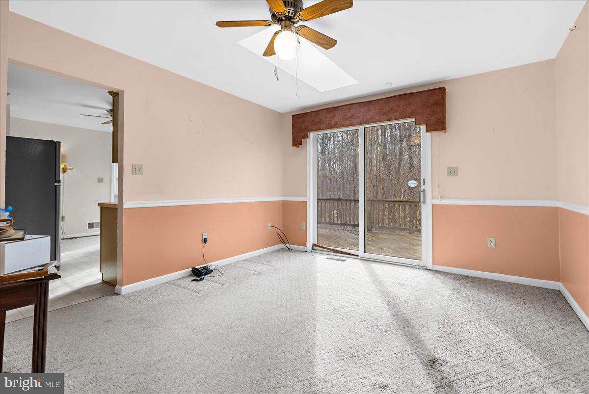 5789 Greenock Road Lothian, MD 20711 - Photo 19 of 57 a view of an empty room with a window