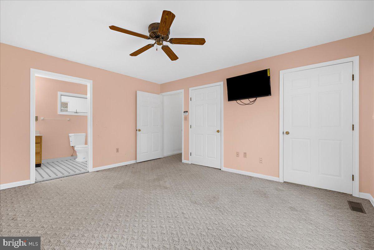 5789 Greenock Road Lothian, MD 20711 - Photo 23 of 57 a view of empty room with ceiling fan