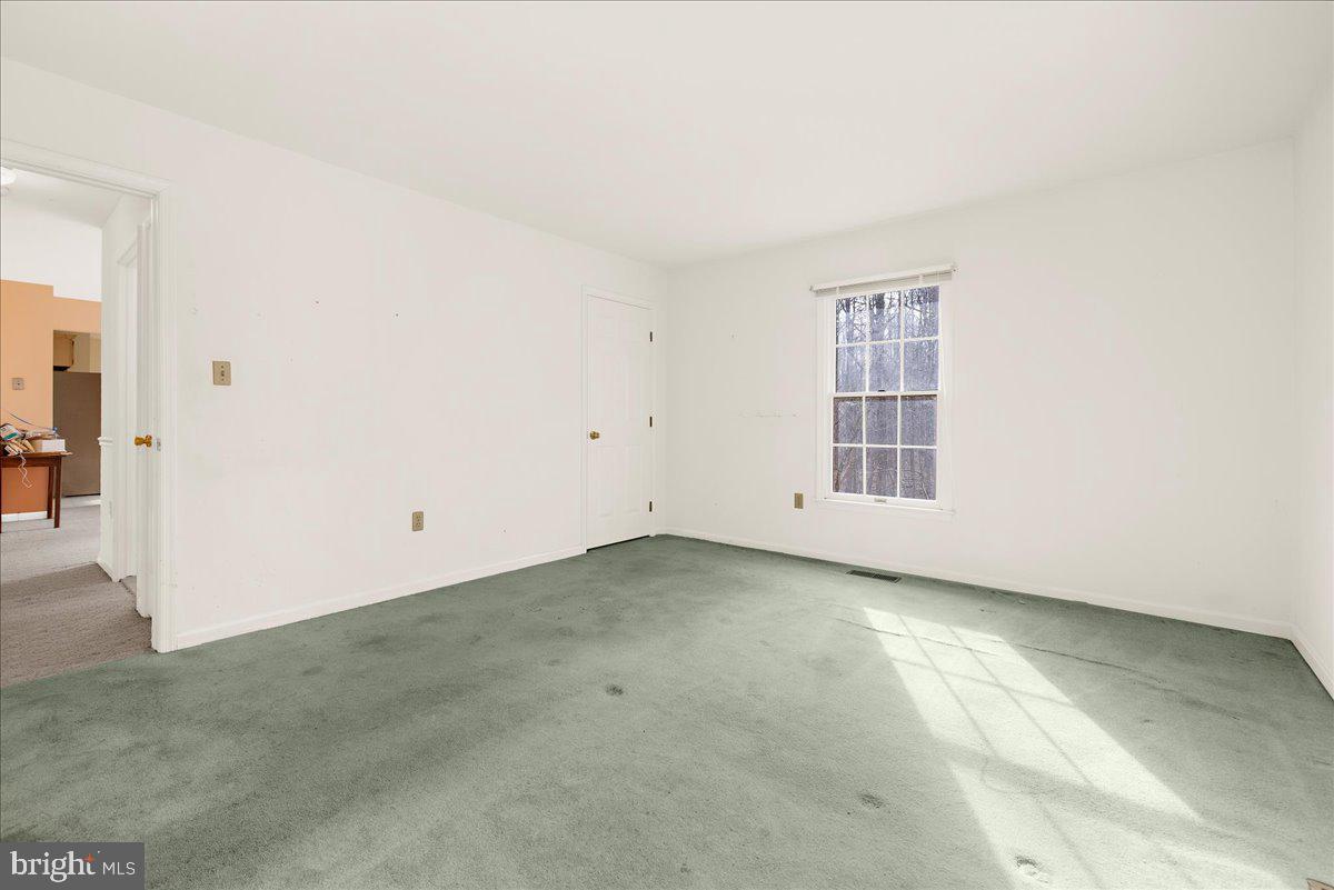 5789 Greenock Road Lothian, MD 20711 - Photo 30 of 57 Upper Level Bedroom 2