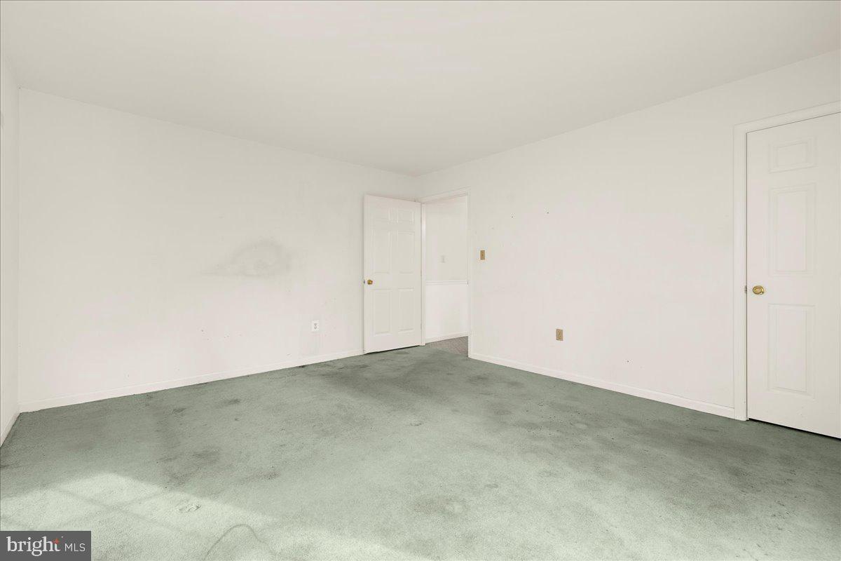5789 Greenock Road Lothian, MD 20711 - Photo 31 of 57 an empty room with an empty room