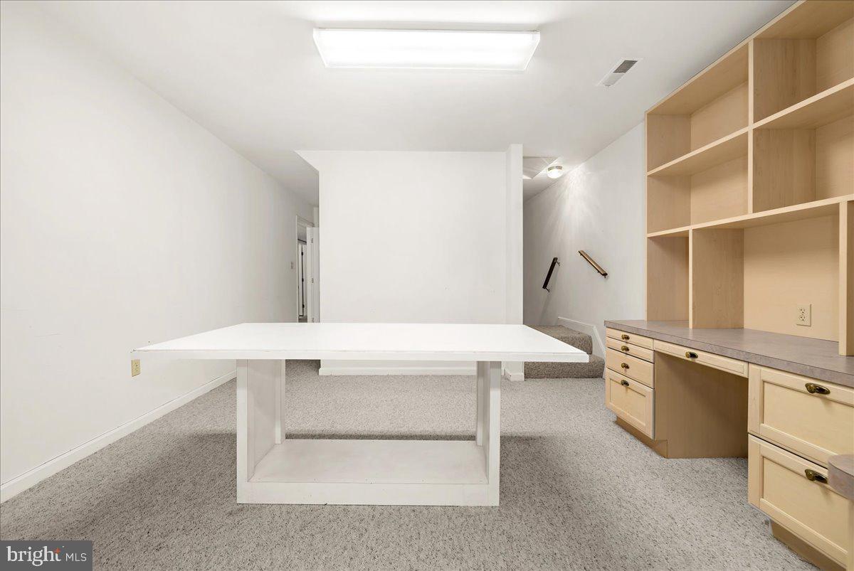 5789 Greenock Road Lothian, MD 20711 - Photo 36 of 57 a view of cabinets and window