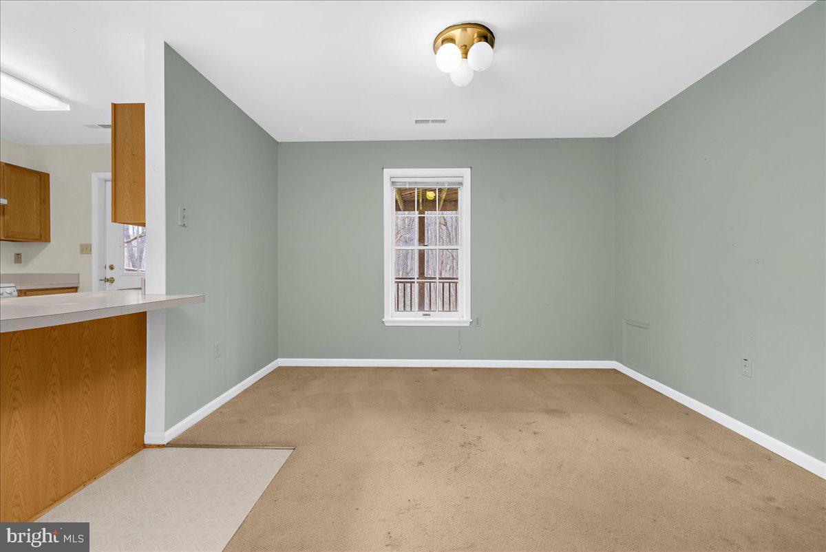 5789 Greenock Road Lothian, MD 20711 - Photo 39 of 57 a view of an empty room with a window