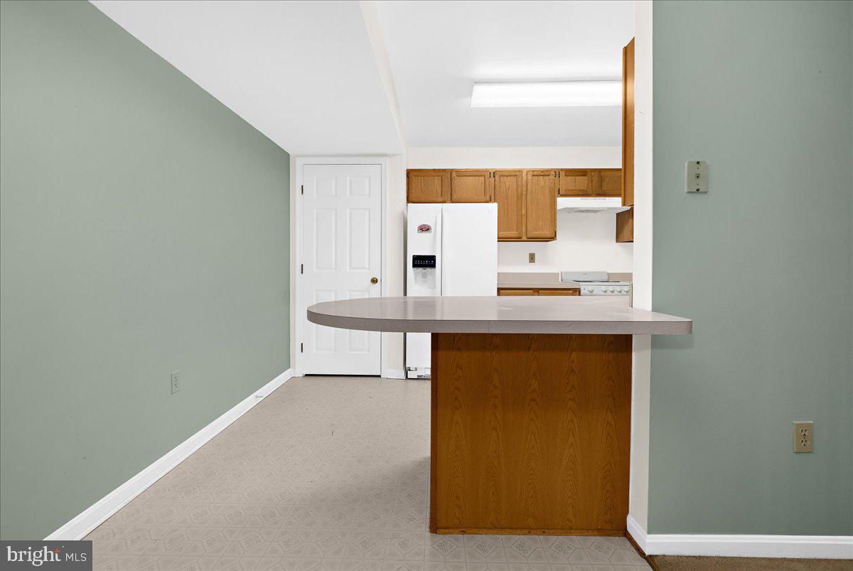 5789 Greenock Road Lothian, MD 20711 - Photo 42 of 57 a bathroom with a sink and a mirror