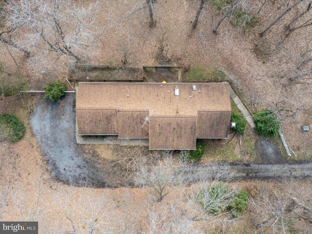 5789 Greenock Road Lothian, MD 20711 - Photo 54 of 57 an aerial view of a house with large trees