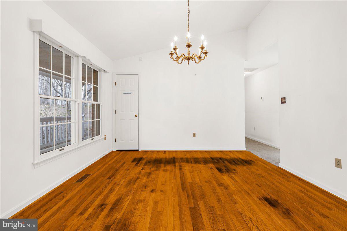 5789 Greenock Road Lothian, MD 20711 - Photo 10 of 57 a view of an empty room with a window