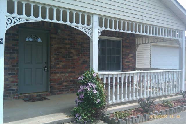 244 Hester Road Portland, TN 37148 - Photo 1 of 13 a front view of a house with a porch