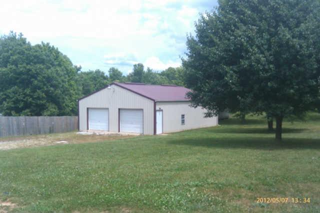 244 Hester Road Portland, TN 37148 - Photo 11 of 13 a house view with a garden space