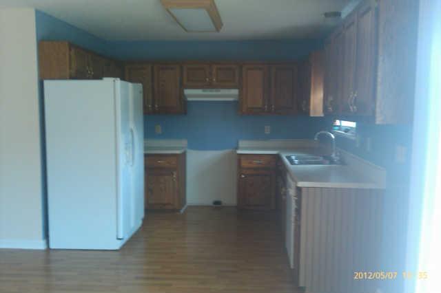 244 Hester Road Portland, TN 37148 - Photo 5 of 13 a utility room with cabinets washer and dryer